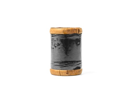 vintage wooden spool thread isolated on white backgroundの写真素材