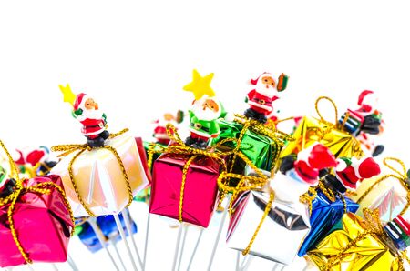 santa claus on gift box on white backgroundの写真素材