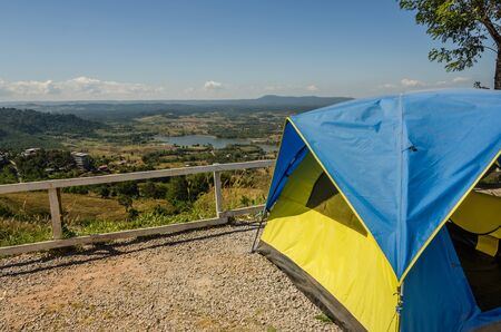 landscape image of mountain against blue sky and tentの写真素材
