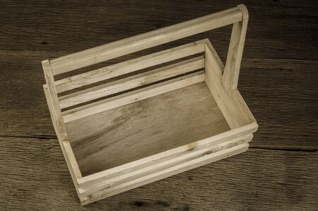 empty old wooden box on wooden table,empty tool boxの写真素材