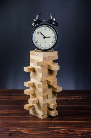 wooden block tower stack game on wooden board backgroundの写真素材