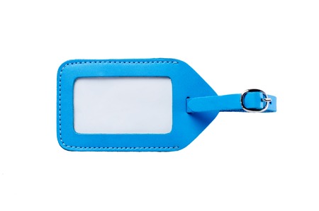 blue leather luggage tag isolated on white backgroundの写真素材