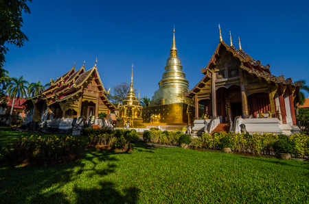 Old Church and golden pagoda at phra singh temple at the northern of Thailand ,Chiangmai ,Thailandの写真素材