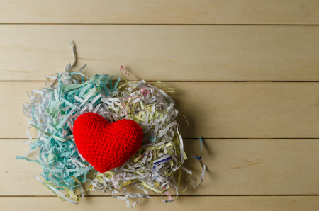 love heart shape on shredded paper , love valentine day concept Pile of shredded paper 