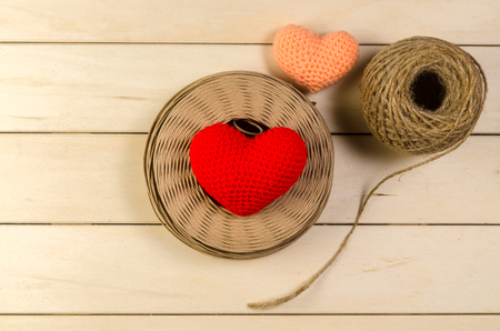 heart shape with roll of twine cord on wooden board , love valentine day conceptの写真素材