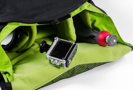 action camera and mini tripod in camera bagの写真素材
