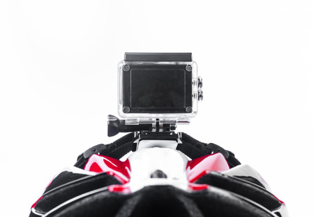 action camera mounted on bike helmet isolated on white backgroundの写真素材