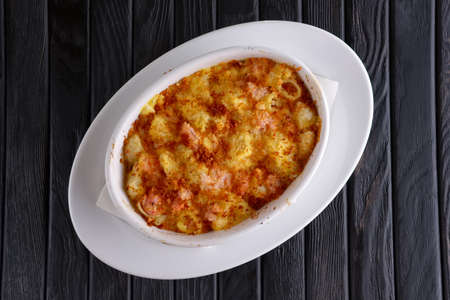 Pasta baked with shrimps and cheeseの写真素材