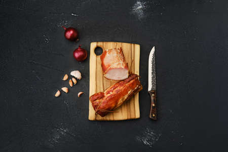 Air dried pork meat on wooden cutting boardの写真素材
