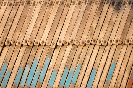 stack of wood beach chairsの写真素材