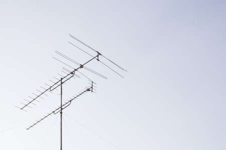 A tv antenna with the clear skyの写真素材