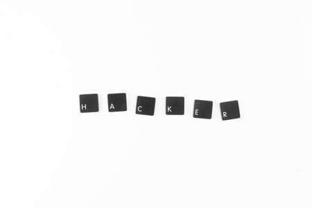 Hackerword written with black computer keyboard keysの写真素材