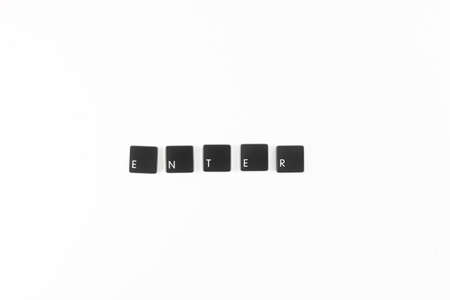 Enter word written with black computer keyboard keysの写真素材