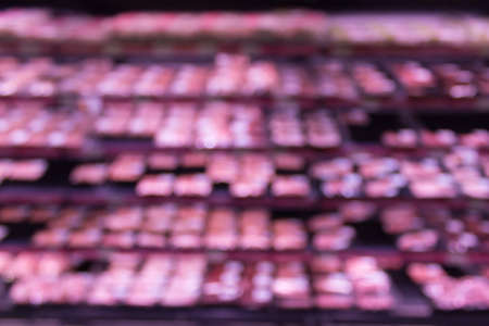 Abstract blur interior meat shelves at supermarket in shopping mall for backgroundの写真素材