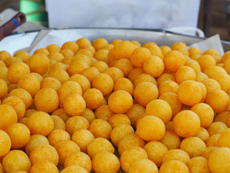 Thai fried sweet potato balls for sale in marketの写真素材