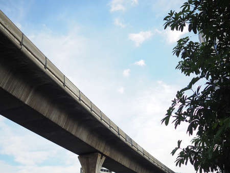 Concrete structure of BTS skytrain tracks on sky backgroundの写真素材
