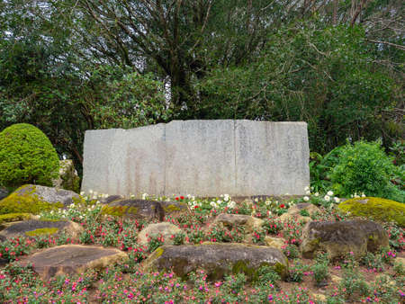 Blank of stone billboard for advertisement in the garden.の写真素材