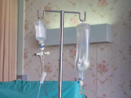 Close-up of saline solution drip for patient.