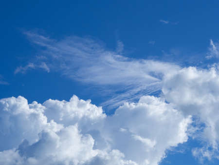 Blue sky with white clouds background.の写真素材
