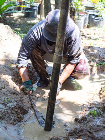 Close-up of workers drilling groundwater until found water. Groundwater solves water shortage problems. Solve the droughtの写真素材