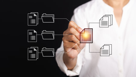 A businesswoman's pressing sign sheets of a document on a virtual screen while standing on a black background. Document management system online. Corporate business technology and security concept.の写真素材