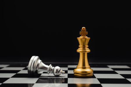 Chess pieces on board game planning and competition on black background. Business leadership and...