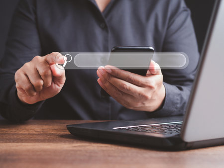 Search engine online concept. Close-up of hand a man using a laptop for searching information on a web browser. Technology and communication.の写真素材