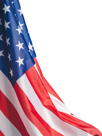 A Close-up of the American flag is on the left side on a white background with copy space for text....