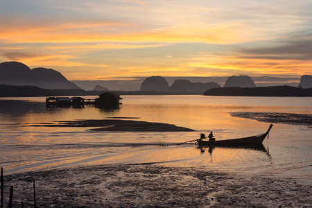 Sunrise At the fishing villageの写真素材