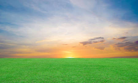soccer field and beautiful sunset skyの写真素材