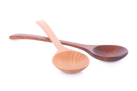wood spoon isolated on whiteの写真素材