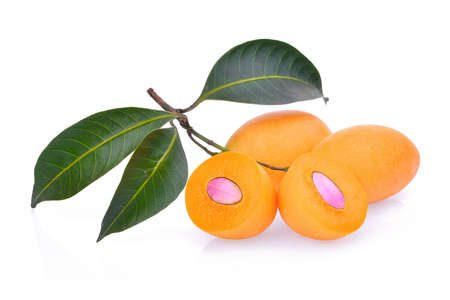 marian plum fruit with leaves isolated on white backgroundの写真素材