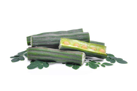 pod of  moringa (drumstick tree) with leaves isolated on  white backgroundの写真素材