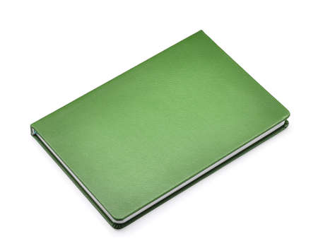 green notebook isolated on whtie backgroundの写真素材