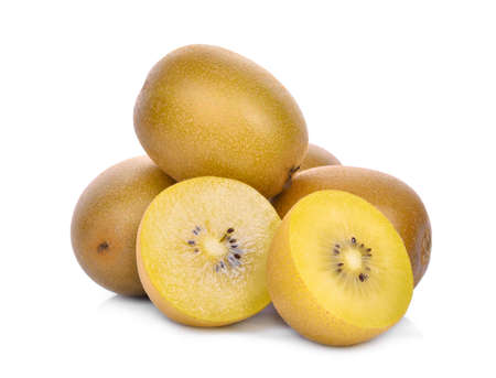 whole and half of yellow or gold kiwi fruit isolated on white backgroundの写真素材