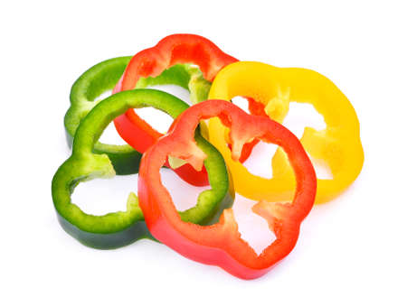 slice of sweet bell pepper or capsicum isolated on white backgroundの写真素材