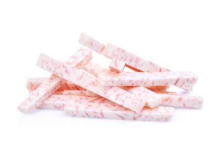 pile of taro root stick isolated on white backgroundの写真素材