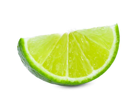 sliced fresh green lime isolated on white backgroundの写真素材
