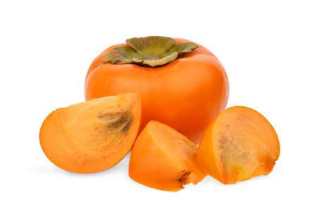 whole and slices of fresh ripe persimmons isolated on white backgroundの写真素材