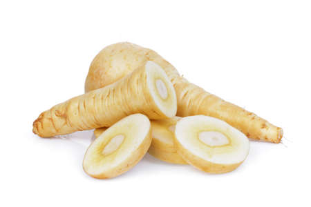 parsnip root with slices vegetable isolated on white backgroundの写真素材