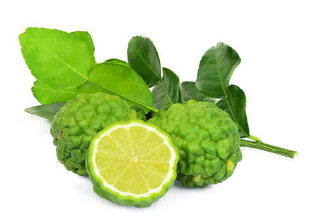 whole and half bergamot fruit with leaf isolated on white backgroundの写真素材