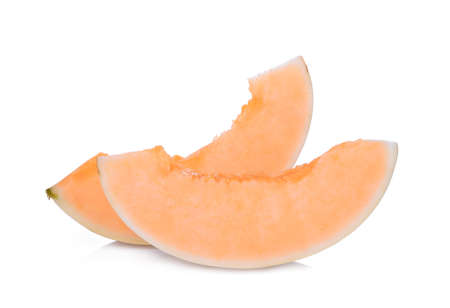 sliced honeydew melon(sunlady) isolated on white backgroundの写真素材