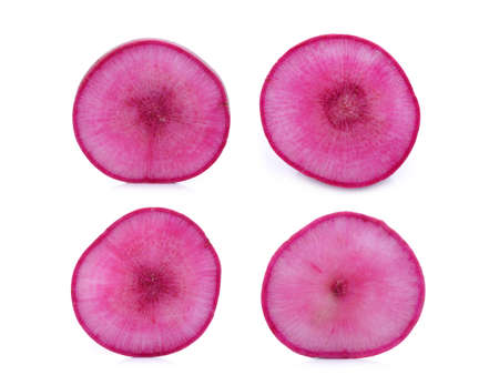 sliced sweet red radish isolated on white backgroundの写真素材