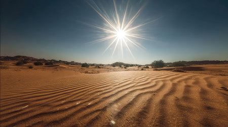 Breathtaking desert landscape features undulating sand dunes beneath a radiant sunburst, showcasing the beauty of nature in a tranquil setting.の素材