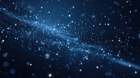 This captivating image showcases a starry night sky filled with bright stars and sparkling particles against a deep blue background, creating a dreamlike atmosphere.の素材