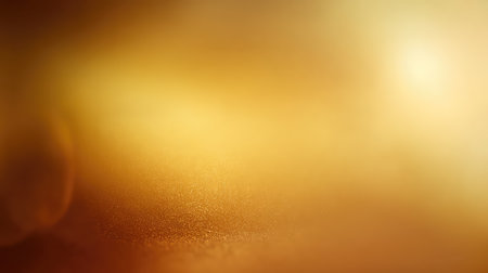 This image features a soft warm golden abstract background with subtle texture, perfect for creative design, artistic projects, and serene visuals.の素材