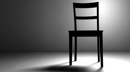This image showcases a striking silhouette of a black chair against a soft gray background, emphasizing minimalism, elegance, and solitude.の素材