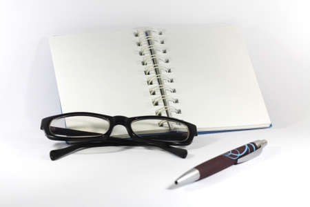 Notebook with eyes glassesの写真素材