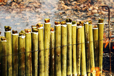 glutinous rice roasted in bamboo joints , Burn cookingの写真素材