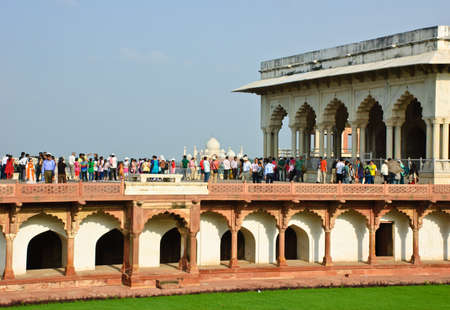 Crowded visitors looking Taj Mahal from view of Agra fort, Indiaのeditorial素材